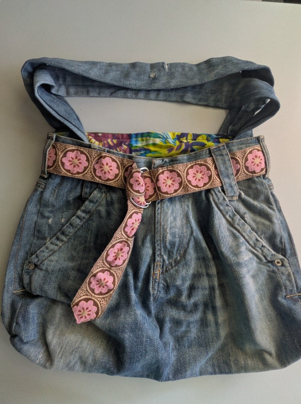 Denim Tote Bag with Pink Floral Embroidered Belt Accent - Likely handmade